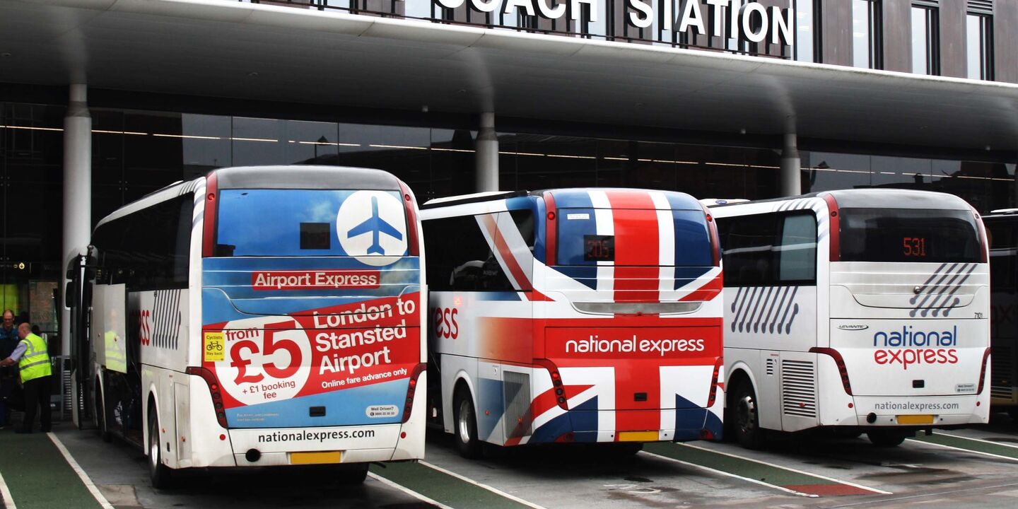 Advertising and corporate rear bus wraps on National Express coaches